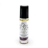 Crown Chakra roller bottle showing label and amethyst crystals. Soul Ritual charka roller collection for crown chakra infused with reiki, amethyst crystals, and essential oils for your energetic well-being,