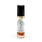 Sacral Chakra roller bottle showing label and crushed carnelian gemstones. Soul Ritual chakra roller bottle collection for sacral chakra infused with reiki, carnelian and chakra essential oil blend for your energetic well-being.