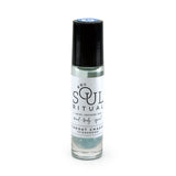 Throat Chakra roller bottle showing label and crushed aquamarine gemstones. Soul Ritual chakra roller bottle collection for Throat chakra infused with reiki, aquamarine and chakra essential oil blend for your energetic well-being.